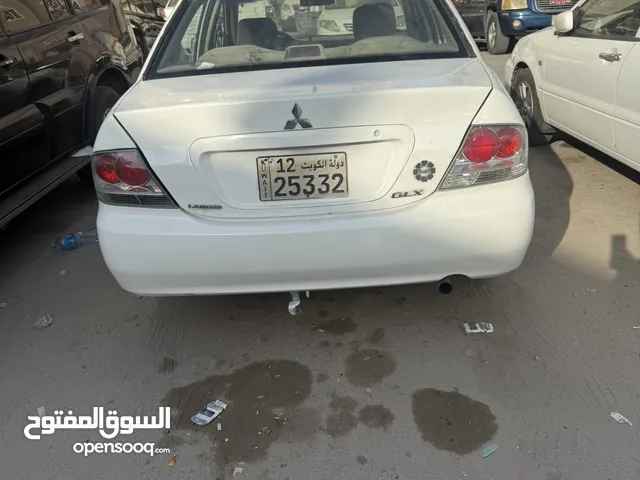 لانسر 2007 لا تحتاج اي مصاريف نهائي قير مكينه شاصي كله تمام مكيف تلج بيمه لحد شهر 3 /2026