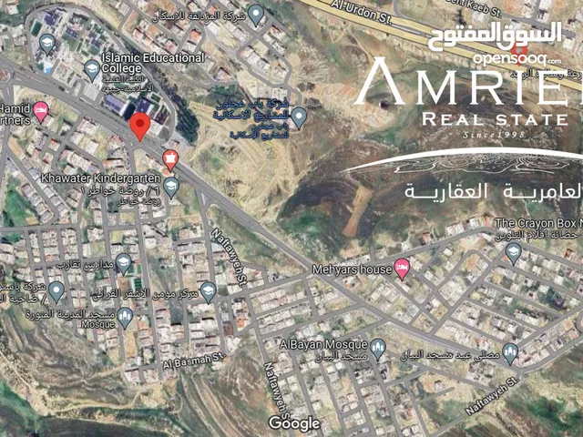 ارض سكنية للبيع في ضاحية الرشيد / قرب الكلية العلمية الاسلامية بالعالي . ( مميزة )