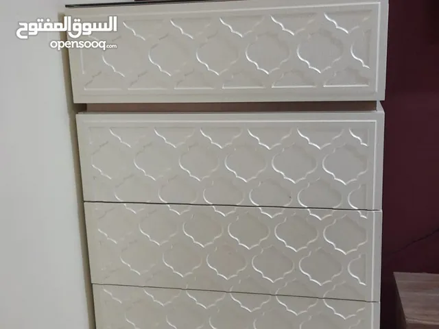 CHEST OF DRAWERS,USED IN THE LIVING ROOM