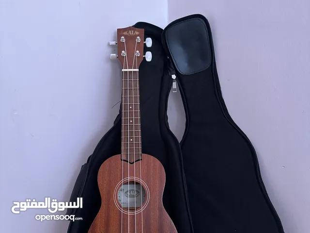 ukulele kala ka-15s يوكيليلي اصلي جديد مع الشنتة نوعية ممتازة جدا اوتار اصلية جديدة نوعية نضيفة