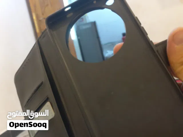 حافظة دفترية السعر 15 الف معا التوصيل