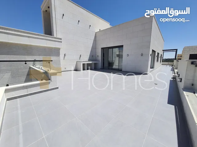 روف طابقي باطلالة عالية للبيع في طريق المطار بمساحة بناء اجمالية 391م
