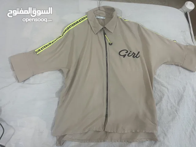 قميص نسائي قياس ميديم بيجي مستعمل