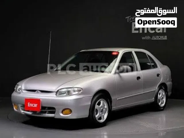 سيارة هيونداي اكسنت موديل 1995 لون أخضر فحص كامل ومعدة للبيع