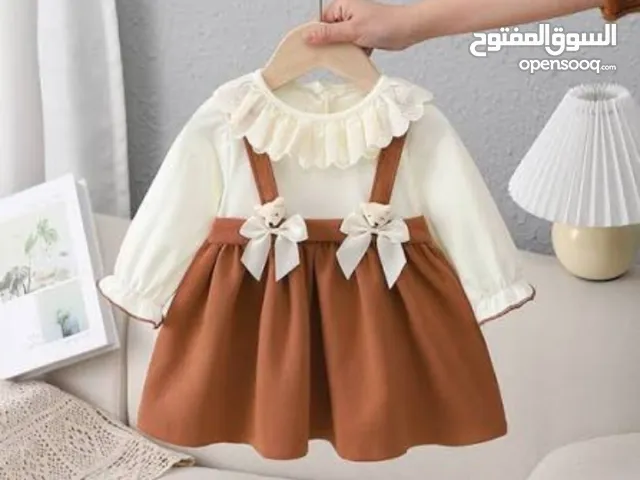 فستان بني بابيض