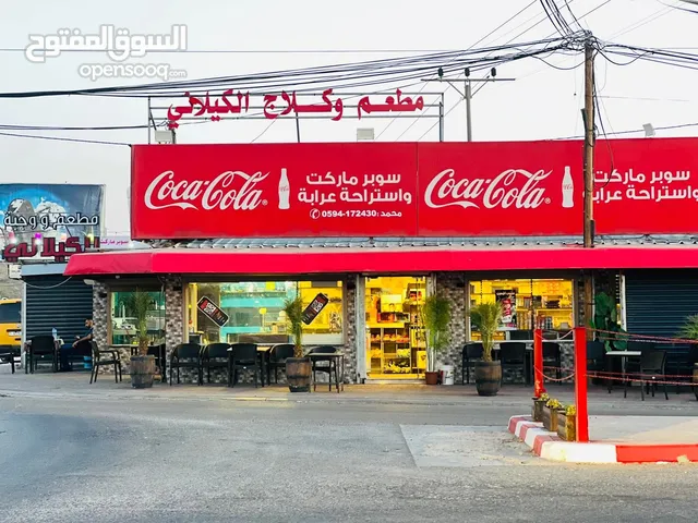 فرصة استثماريه رائعه محل تجاري للبيع في الكامل على دوار محطة عرابه_ جنين مرخص طابو سالم للبيع والتنا