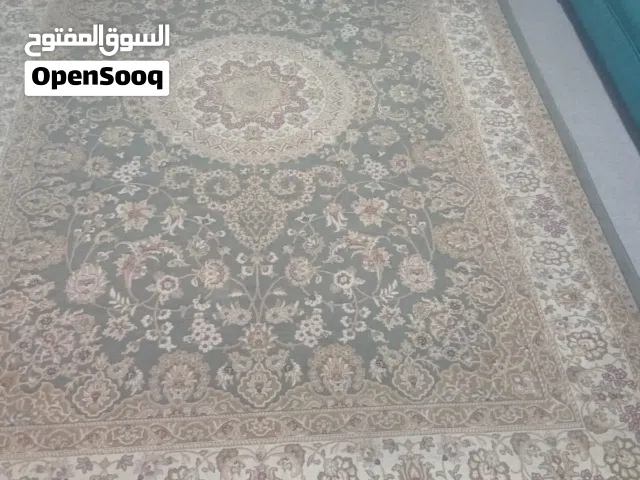 طقم كنب كورنر لون زيتي مع سجادة