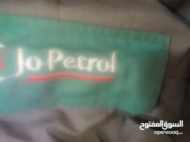 ملابس عمال كازية جو بترول مستعمل مجاني