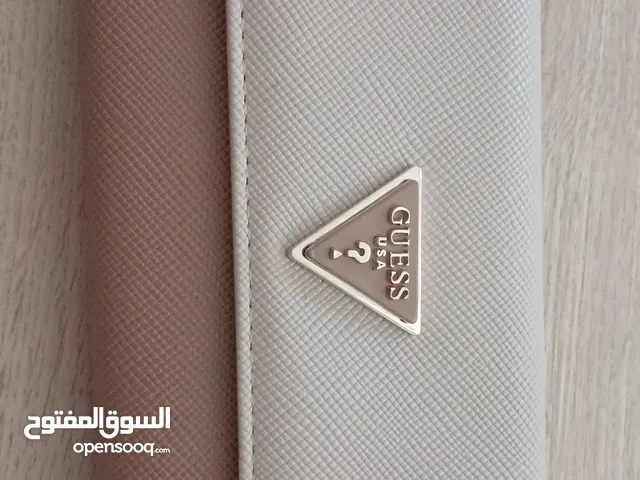 Beige GUESS for sale in Amman