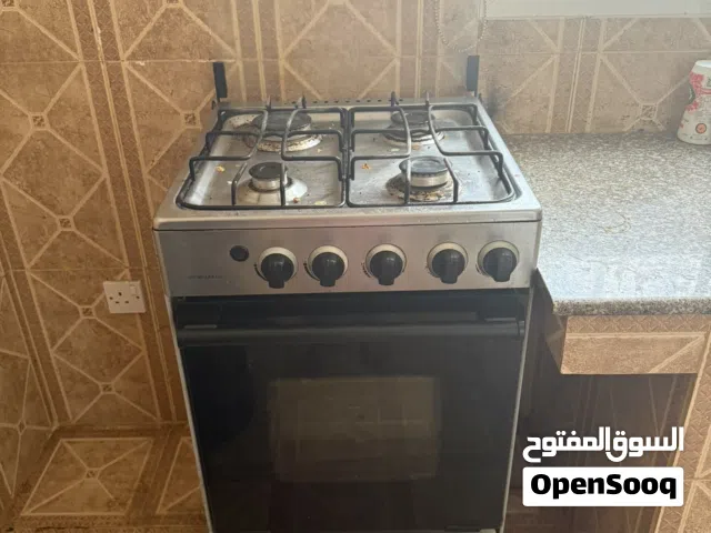 Refrigerator, cooking stove & cupboard