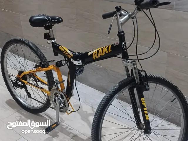دراجة upten اصلية باللون الاصفر و الاسود، بسعر رخيص و جيد و مريحة جدا و غير مزعجة ابدا (26in)