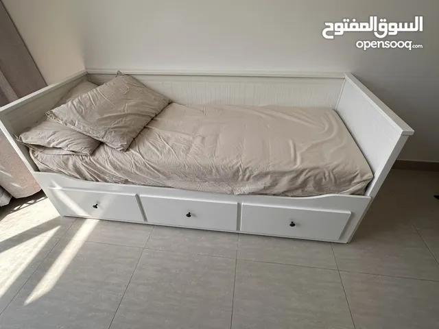 Day bed with mattress and pillows