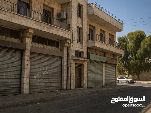 فرصة إستثمارية عمارة تجاري طابقين للبيع - جبل الحسين بالقرب من موقع جبل القلعة الأثري