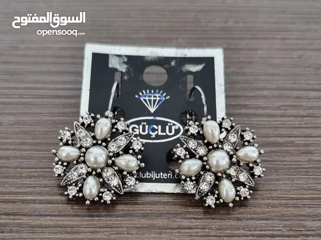 Earrings with stones