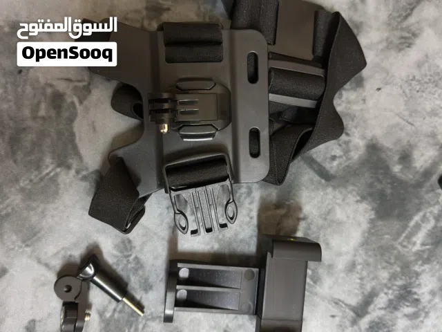 ستاند حامل الهاتف او كامرة الجو برو يلبس على الجسم.