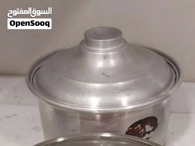 طنجرة وبراد شاي وعمود اكل استلس