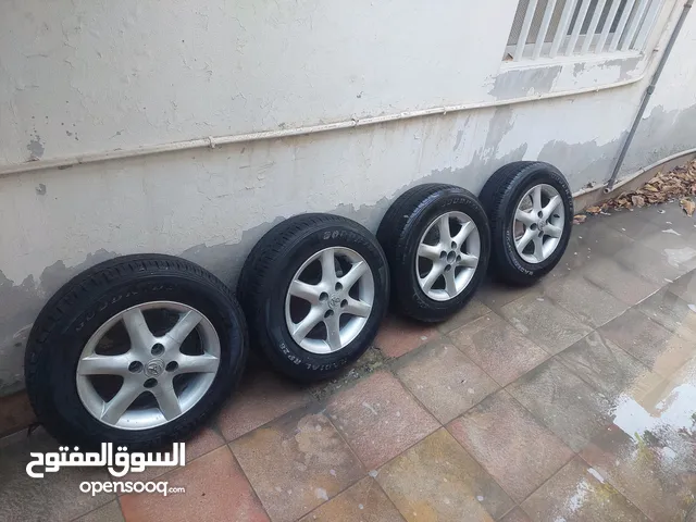 للبع رنقات تيوتا كرولا 4 بلوط مع الاطارات 2007