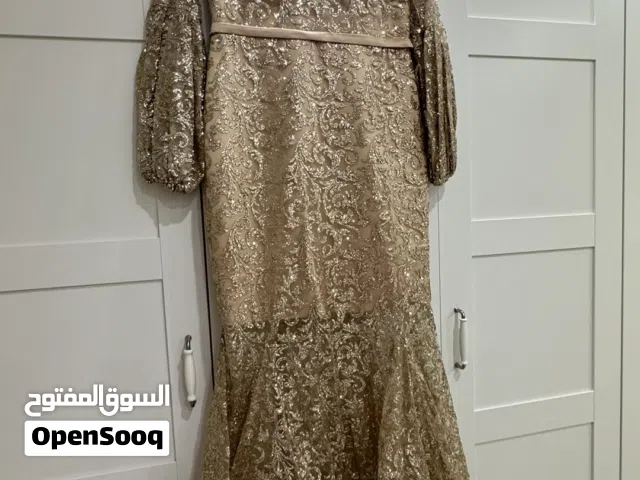فستان سهره ذهبي ملبوس مره وحدة