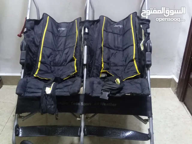 عرباية أطفال توأم للبيع بحاله جيده جدا