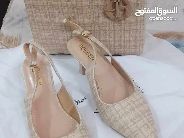 حقيبة مع حذاء......ماركة Dior