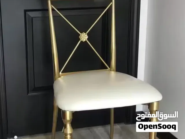 Luxury in Every Detail   Gold Cross-Back Dining Chair