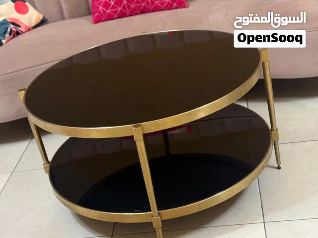 Elegant Modern Coffee Table – Black Glass with Gold Finish