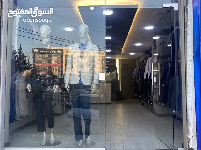 محل ملابس رجالي للبيع