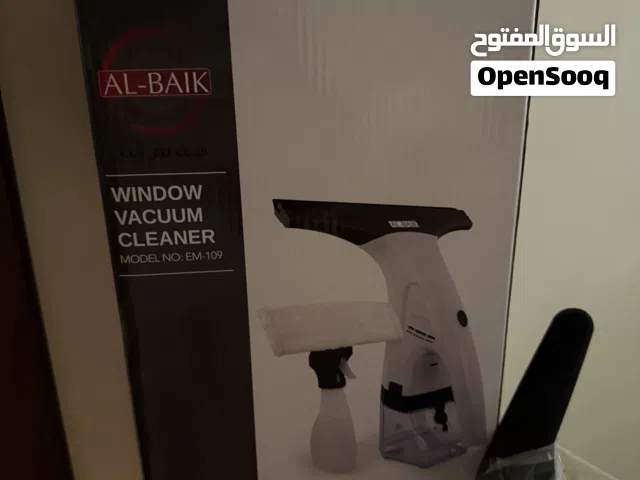 جهاز تنضيف الشبابيك و الأسطح و المرايا