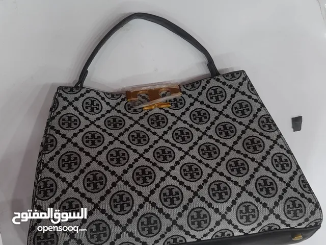 شنطة يد نسائية. ماركة TORY BURCH.