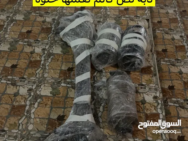 طيات تنزيل + تيوب مع شيالات سباق للتماسك على الإنعطافات + دبة نص كاتم صوت ( ماتحبس العزم )