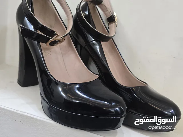 Black With Heels in Aqaba