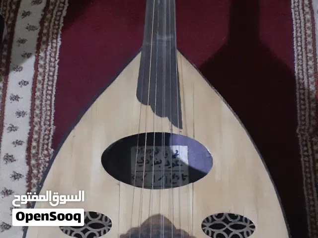 عود عراقي خشب قديم ومميز (لعشاق الطرب الأصيل والأنغام الدافئة)