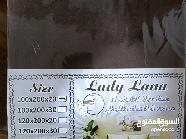 شرشف فرشة مطاط جديد بورقته، قياس 200 في 100 سم. لون بني، ولون اسود elastic mattress cover