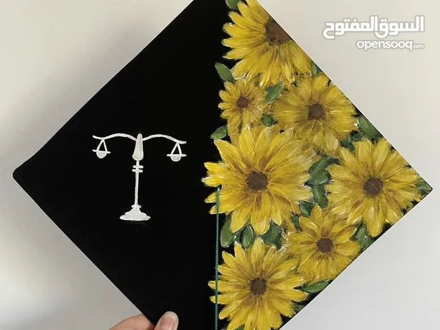 رسم على طاقية التخرج