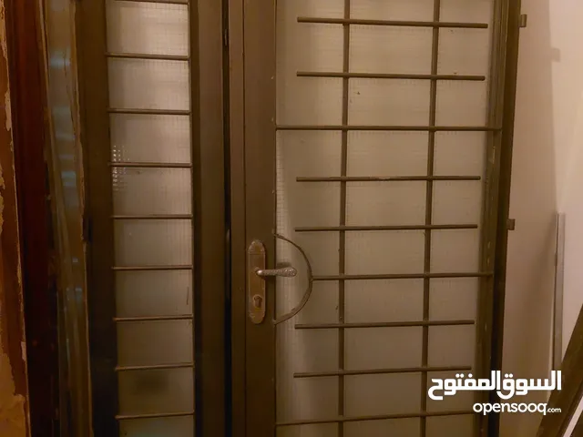 باب حديد عرض 130 ارتفاع 200 بحال الوكاله