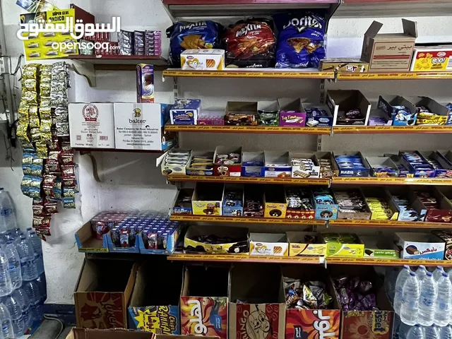 سوبر ماركت على الشارع الرئيسي في جبل الجوفة للبيع خلو