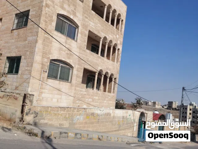 عماره اربع طوابق حجر