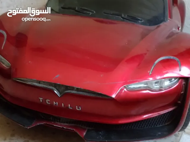 سياره تسلا لعبة اطفال للبيع