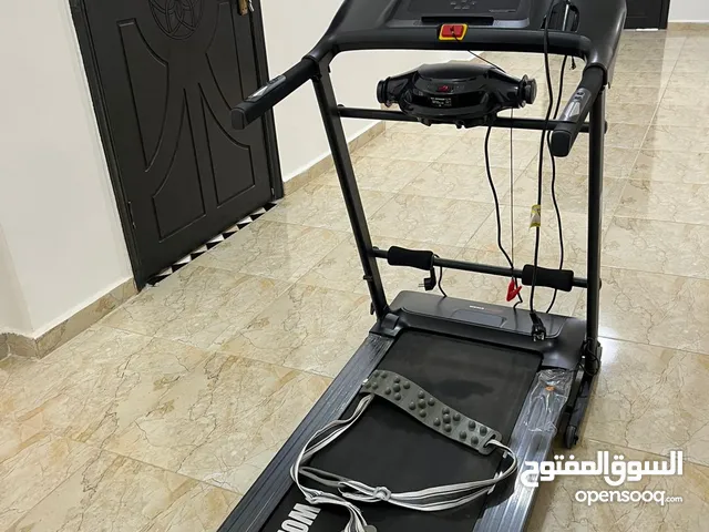 جهاز ركض منزلي مع حزام تدليك. بحال الوكالة
