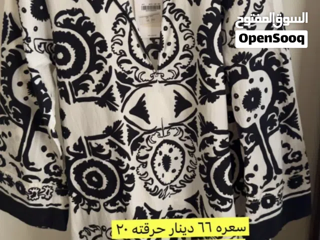 فساتين براند اصلي بسعر حرق والسعر علي تحدي ظروف سفر معروض في الصور