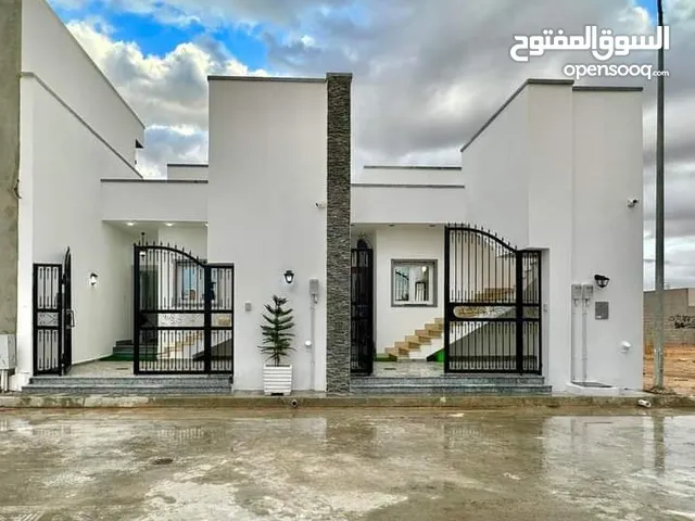 2منازل أرضية تشطيب حديت  #الموقع عين زارة بين جابر بن حيان والحاراتي  مقسم قطران 14متر #السعر 330الف