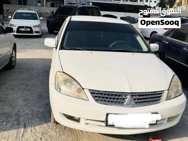 2012 ميتسوبيشي لانسر Standard
