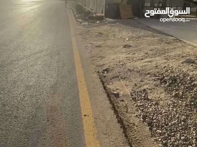 مبنى تجاري صاله وفوقها 8 شقق تحتها رفودجو في تاجوراء