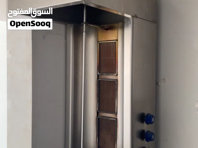 مكينة شوارما. وطاولات ستان ستيل دبل