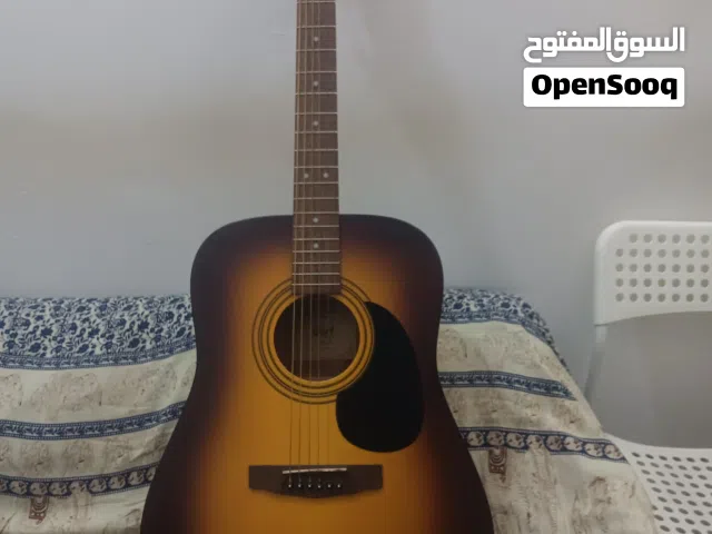 Original New Cort professional acoustic guitar. Brand new condition.