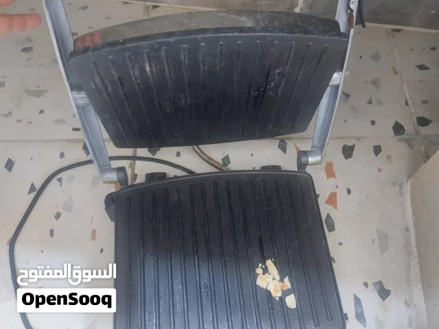 مطلوب شواية لحم هومر مستعملة  زي الي في الصورة