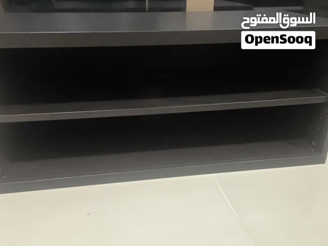 dark brown tv table and shelf
