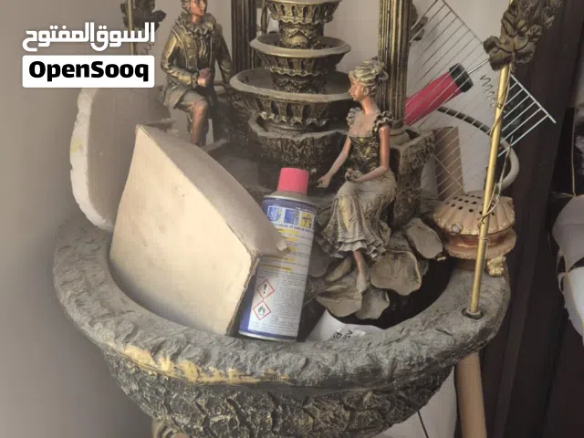 نافورة ماء وعربة