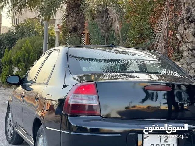 كيا شوما 1999