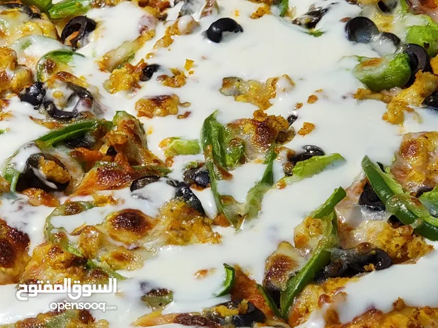 بيتزا منزليه صنعت بحب ونظافة واتقان